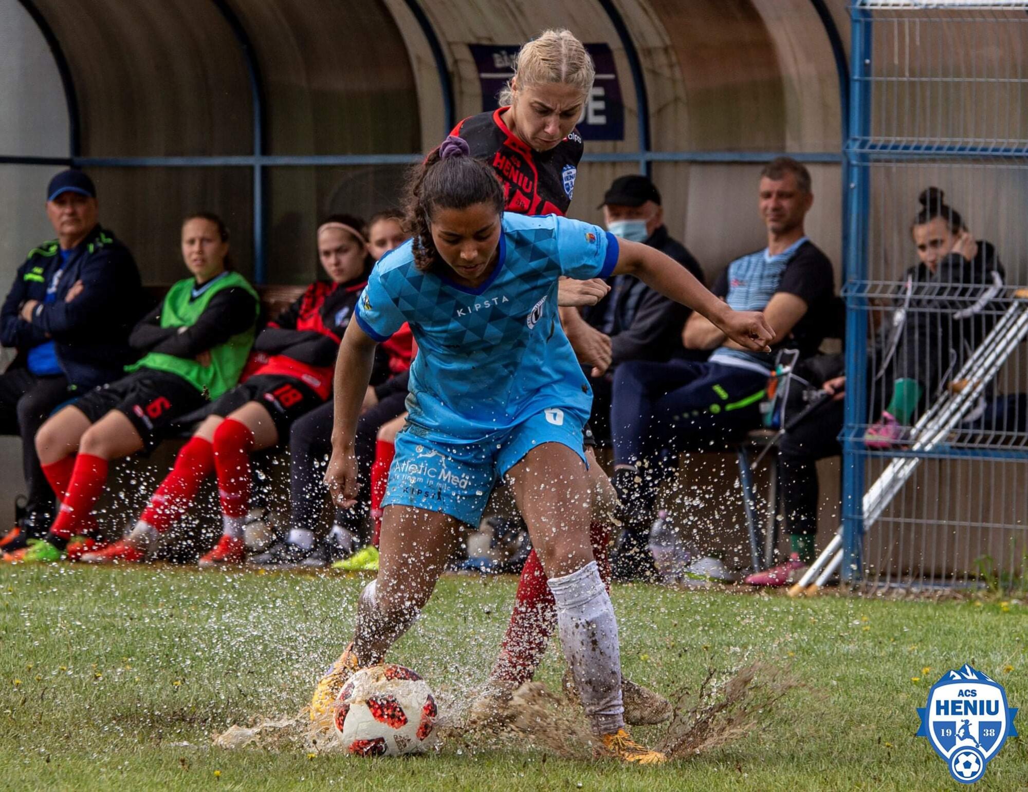 defending soccer ball in mud
